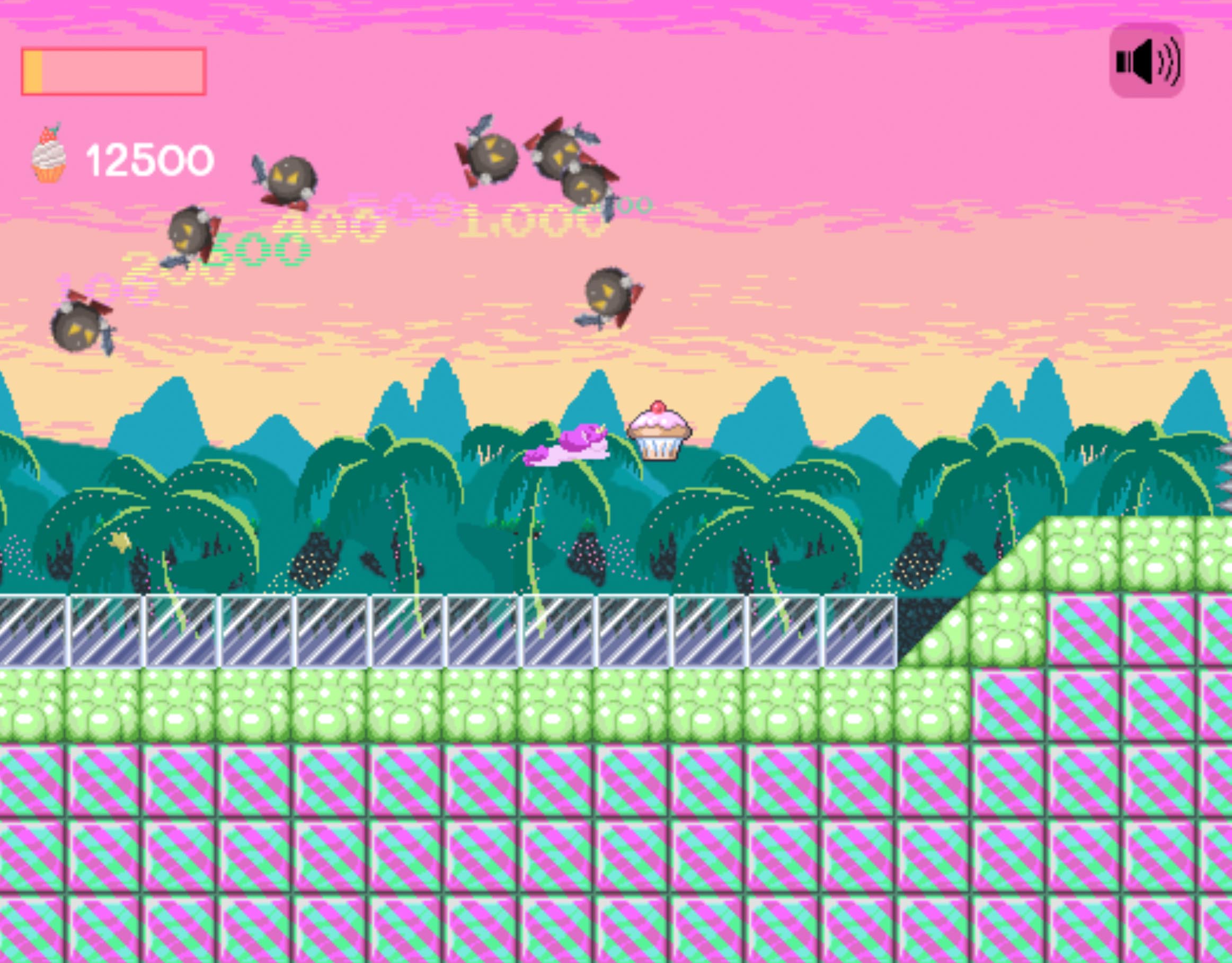 This is a screenshot from Idiom Unicorn. The player is bursting through a bunch of enemies and about to collect a cupcake.